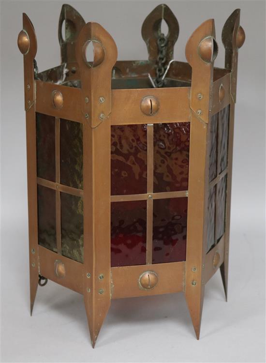 An Arts & Crafts copper and coloured glass hall lantern